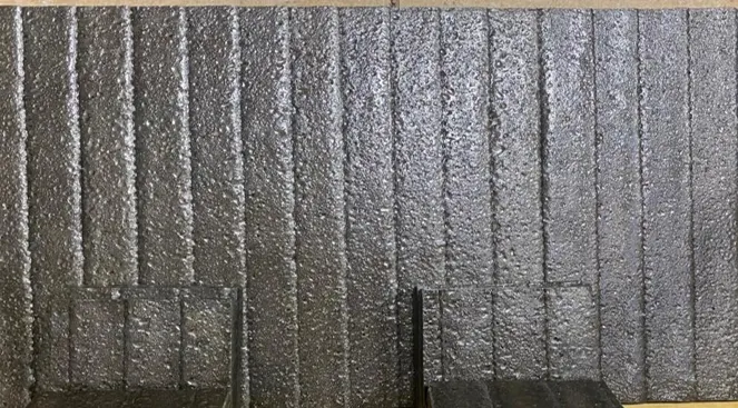 D-Parts wear liner panels with overlay weld beads